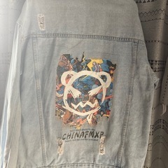 ダメージデニムジャケットの画像