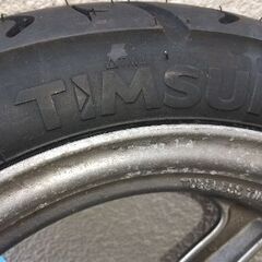 リード110 新品タイヤ付きフロントホイールの画像