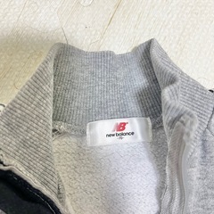 new balance ロンパースの画像