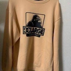 DCエクストララージコラボスウェットベージュ
の画像