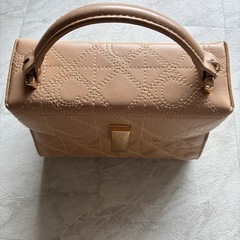 ベージュ　バックの画像