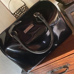 黒のミニ旅行鞄の画像