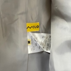 グレーのレディースコートの画像