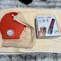 犬用トリマー、湯たんぽ、ブランケットの画像