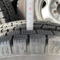 スタッドレスタイヤとチェーンおまけ付きの画像