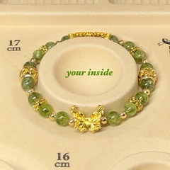 ペリドット 天然石 メタルパーツ 蝶々ブレスレットの画像