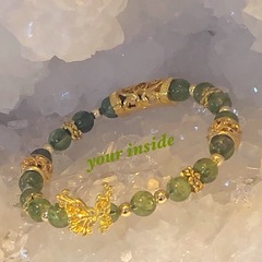 ペリドット 天然石 メタルパーツ 蝶々ブレスレットの画像