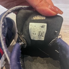 New Balance ネイビー/レッド スニーカーの画像