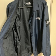THE NORTH FACE ネイビー ナイロンジャケットの画像