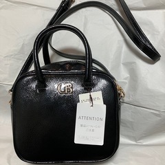 新品、黒エナメルバッグの画像