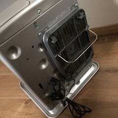 新品ポリタンク付き灯油ファンヒーター　  新品18リットルポリタンク付きの画像