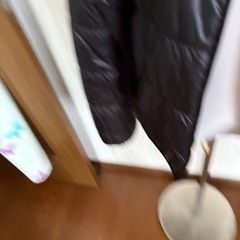 ユニクロ　　黒のジャンパー　フード付きの画像