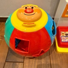 アンパンマンおもちゃ４点とアシックスの画像