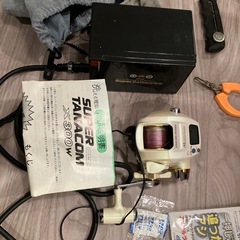 船釣り用電動リールと竿一式の画像