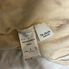 レディース　オフホワイト　パーカーの画像