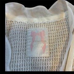 ディズニーコラボ　マリーちゃん　ホワイトメッシュカーディガンの画像