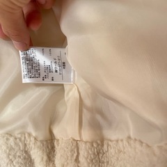 ニットワンピースともこもこアウターの画像