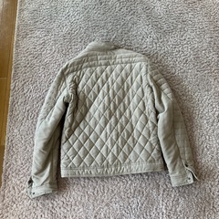 クリーム色 キルティング シングルライダースジャケットの画像