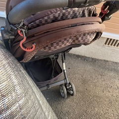 コンビベビーカー　背面クッションやカバー、おもちゃ付きの画像