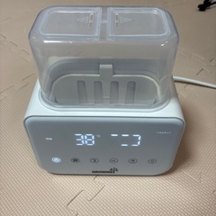 哺乳瓶ウォーマーとメリーズSサイズ未開封の画像