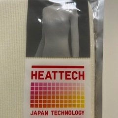 UNIQLO ユニクロ WOMENヒートテックシームレスリブタートルネックT（長袖）EXTRA　WARM極暖  レディース長袖トップス レディース長袖シャツ 長袖ポロシャツ 長袖ブラウス 長袖カットソー オフホワイト色 白色系 Off White ベージュMの画像