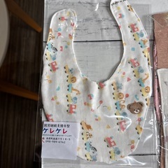 布地で出来た  よだれかけの画像