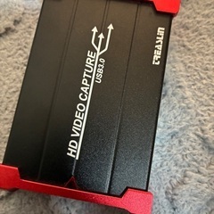USB 3.0接続のHDビデオキャプチャーデバイス。  - モデル名: HD VIDEO CAPTURE - 接続タイプ: USB 3.0 - 色: 黒/赤 - 用途: ビデオキャプチャー  ご覧いただきありがとうございます。の画像