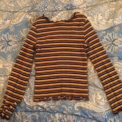 コートとニットの画像