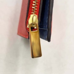 トリー バーチ 二つ折り 財布 オレンジ レディース Tory Burchの画像