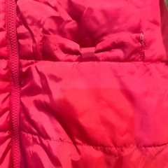 フード付きピンクダウンコートの画像