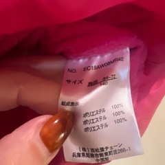 フード付きピンクダウンコートの画像