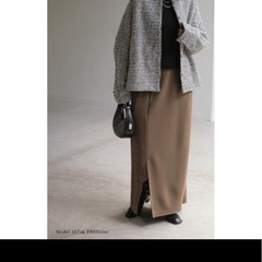 白黒のーかノーカラージャケットの画像