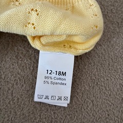 黄色カーディガンの画像