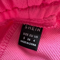 ピンクのスエットの画像