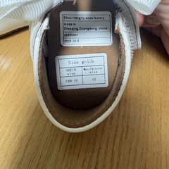 ホワイトリボン付きベビーシューズの画像