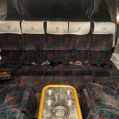 観光バス　　1番後の一列シートの画像