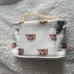 PAUL&JOE ヌネット総柄 持ち手つき バニティ ポーチの画像