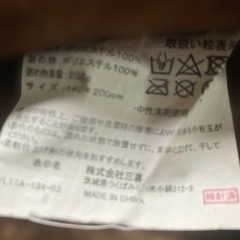 ブラウンのシングル毛布の画像