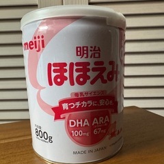 ミルクの空缶の画像