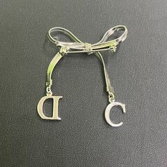 Christian Dior クリスチャンディオール CDモチーフ リボン シルバーメタル ブローチの画像