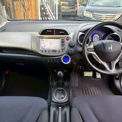 ホンダ フィット ハイブリッド 1.3ナビプレミアムセレクション バックモニター ETC DVD TV ワンセグ ナビ シートヒーター 電動格納ミラー ハイブリッド エンジンスターターの画像