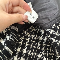 ツイードスーツの画像