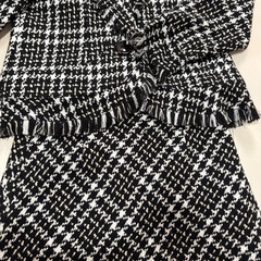 ツイードスーツの画像