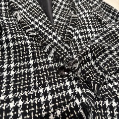 ツイードスーツの画像