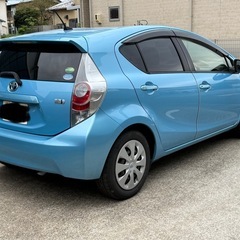 アクア 今月リビルトHVバッテリー交換　車検2年付 スマートキー  ナビ Bカメラ Bluetoothの画像