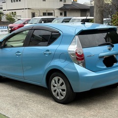 アクア 今月リビルトHVバッテリー交換　車検2年付 スマートキー  ナビ Bカメラ Bluetoothの画像
