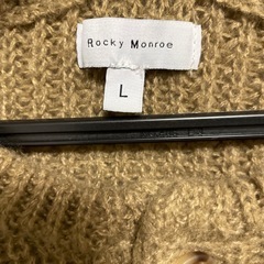 オーバーサイズ畦編みヘンリーネックニットセーターの画像