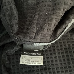 NIKE  防寒着　黒　メンズLサイズの画像