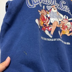 キャプテンサンタトレーナー古着の画像