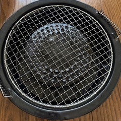カセットコンロの上において使うアミで焼肉の画像
